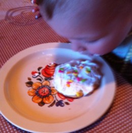 My youngest, inspecting her cookie...